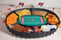 "Custom 3D printed snack stadium in team colors, front view"